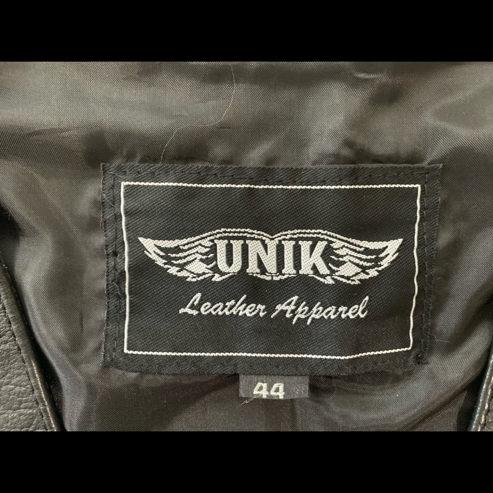 UNIK - Men's 44 leather motorcycle vest with snaps. Never worn, no wear.
